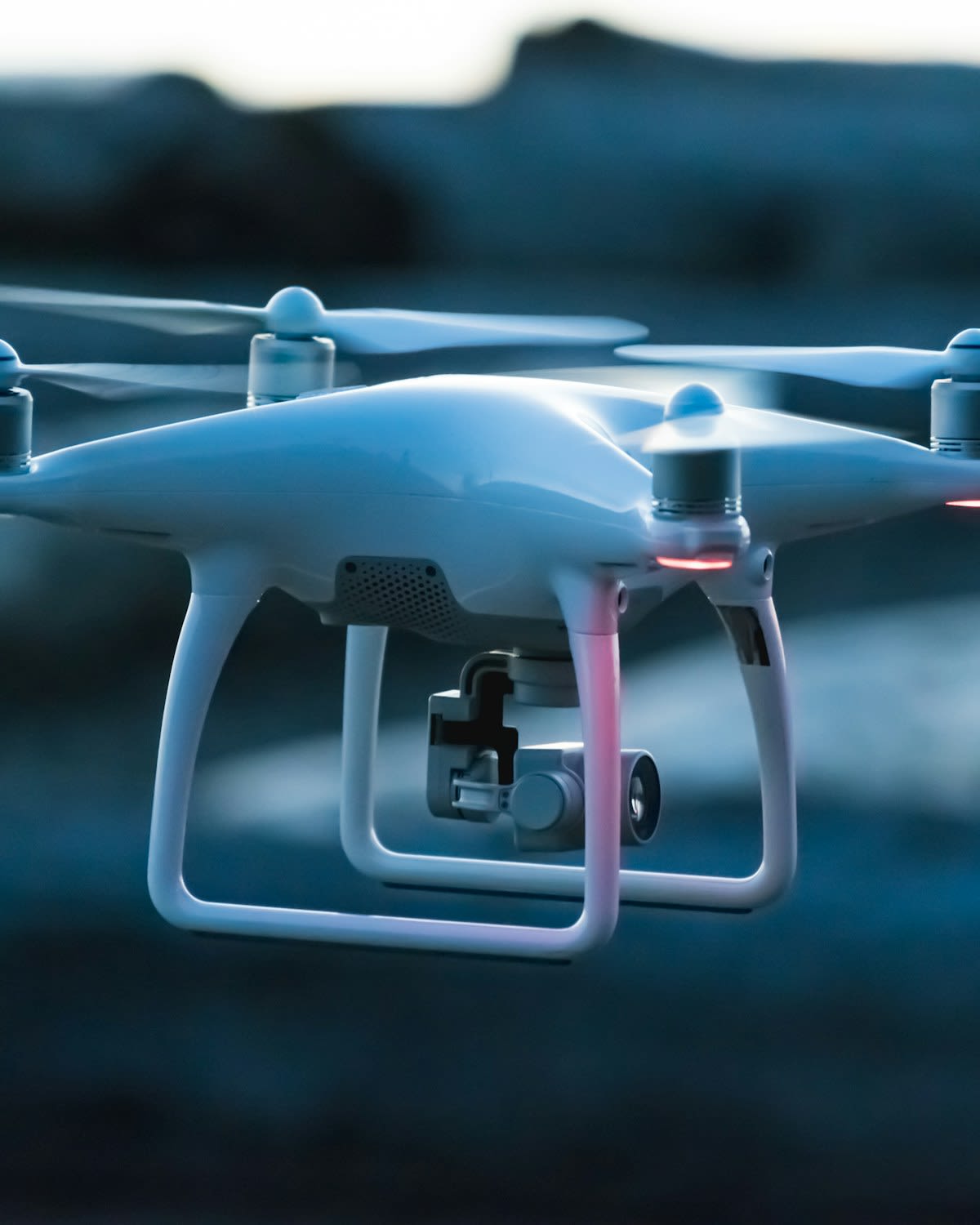 Quadcopter drone on dark studio background
