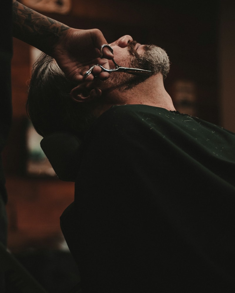 Black and white portrait of a barber